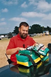 a man with a large first aid kit