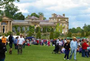 people on the lawns of Bowood House